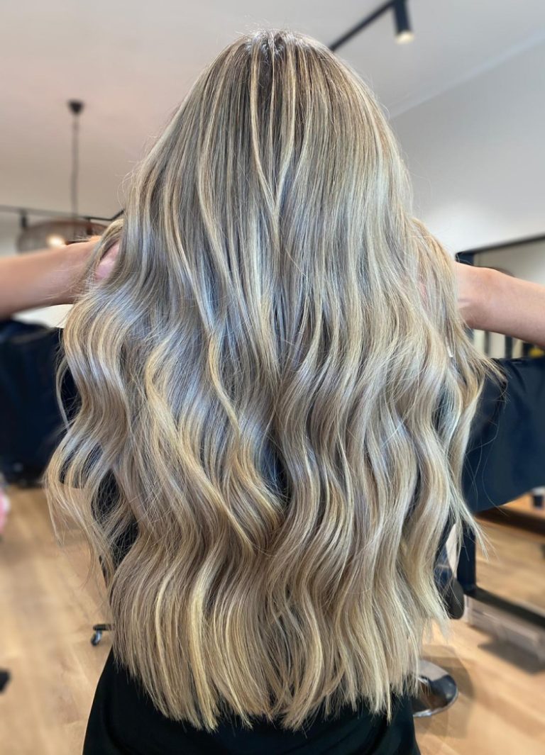 Back view of a girl with balayage hair style